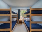 Bunk room with two sets of twin bunks